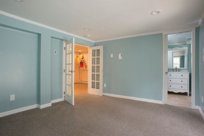 A complete finished basement system in a Manhasset home