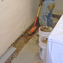 Digging a trench for a French Drain system in Brookhaven