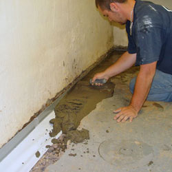 Testing a French drain system in a Freeport home.
