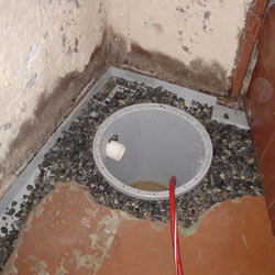 Installing a sump in a sump pump liner in a Oyster Bay home