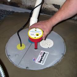 A newly installed sump pump system in a basement in East Meadow