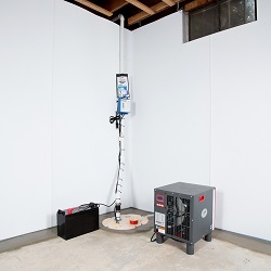a complete basement waterproofing system installed in a Brookhaven home