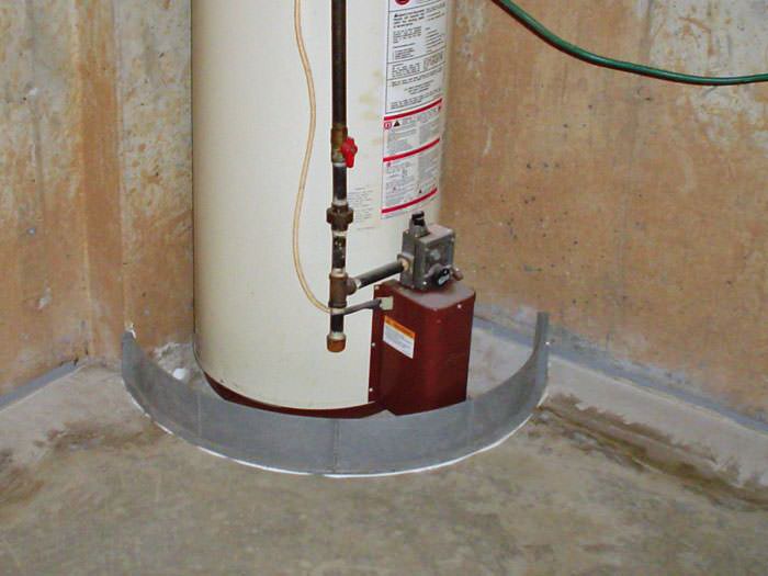 Floodring Water Heater Flood Protection In Li Against An Old Outdated Water Heater System That Is Protected By The Floodring