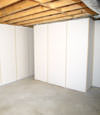 Fiberglass insulated basement wall system in Elmont, LI