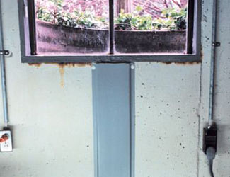 Repaired waterproofed basement window leak in Smithtown