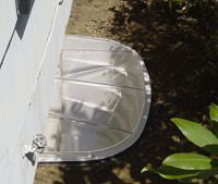 A Leaking Basement Window Repaired with a Covered Basement Window Well